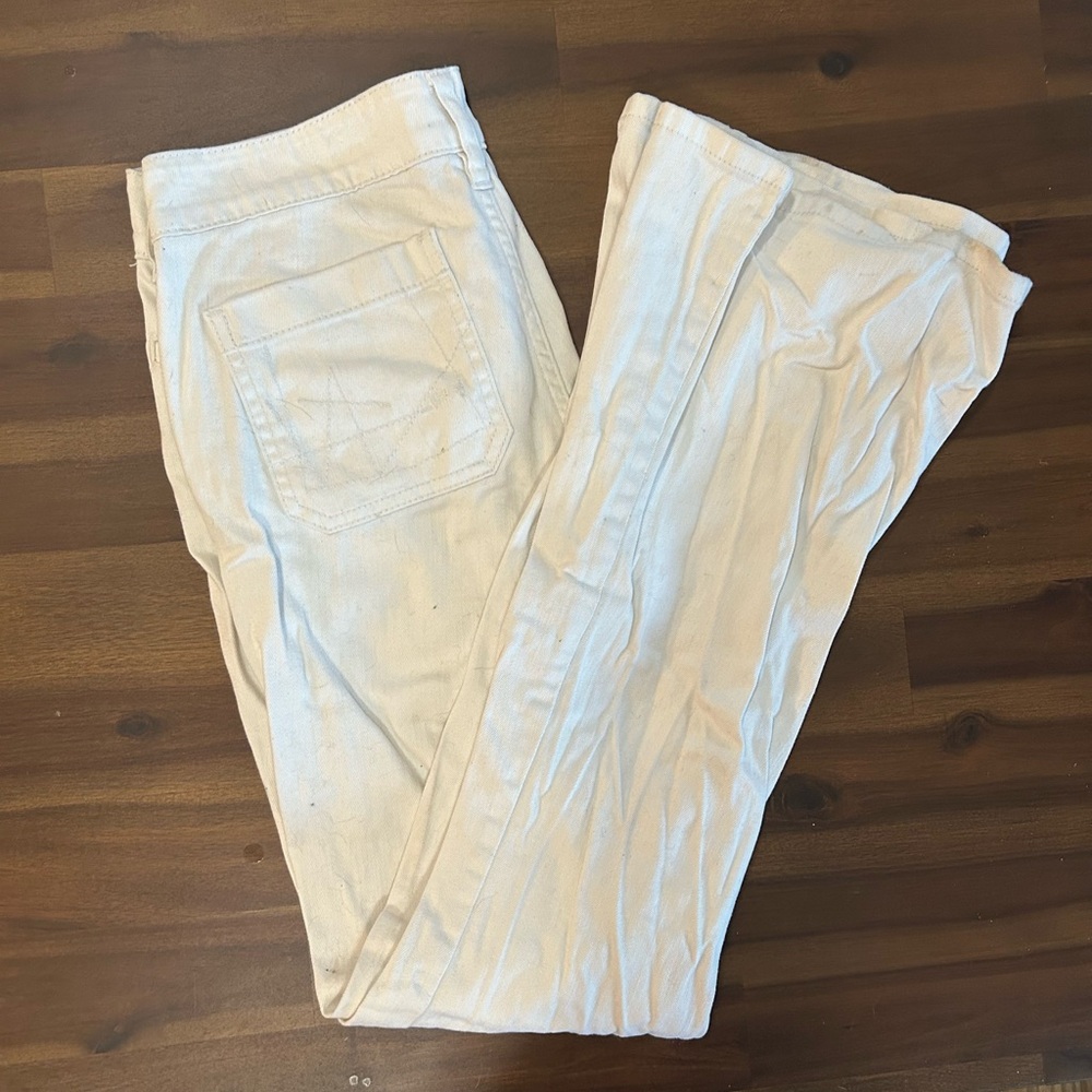 allen b white low waisted flare bell bottom pants with rhinestone button